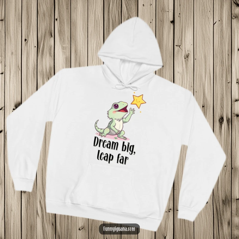 Funny kawaii iguana hoodie, depicted excitedly striving for a sparkling star, symbolizing humorous ambition and cozy comfort.