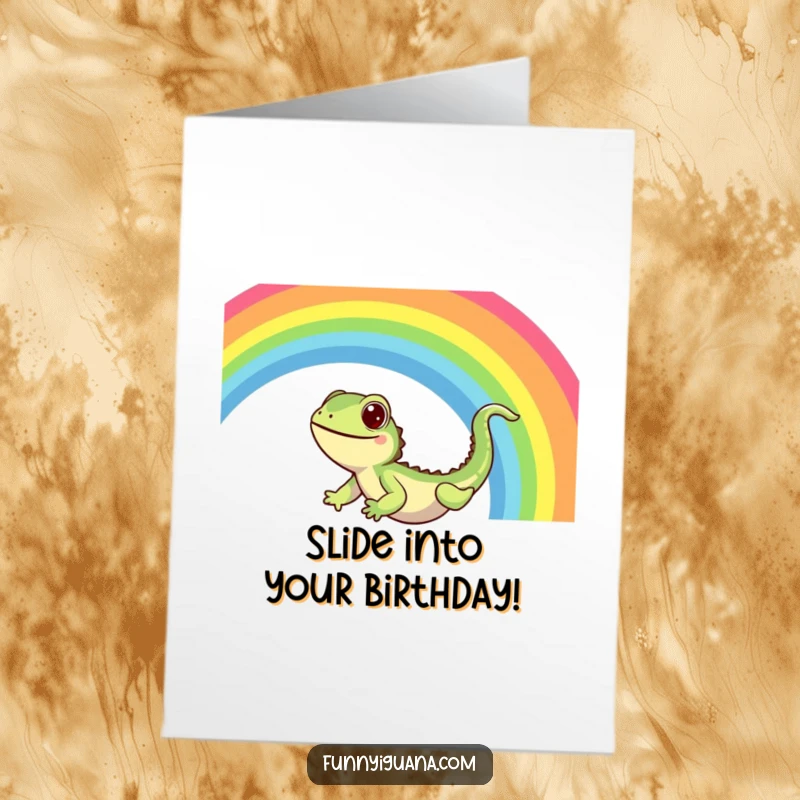 Funny Free Printable Birthday Card: A joyful kawaii iguana gleefully sliding down a vibrant, sparkling rainbow.