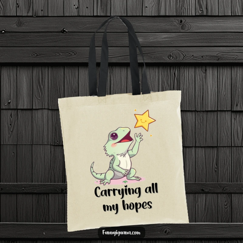 Funny kawaii iguana tote bag, humorously reaching for a shining star, perfect for carrying dreams and groceries alike.